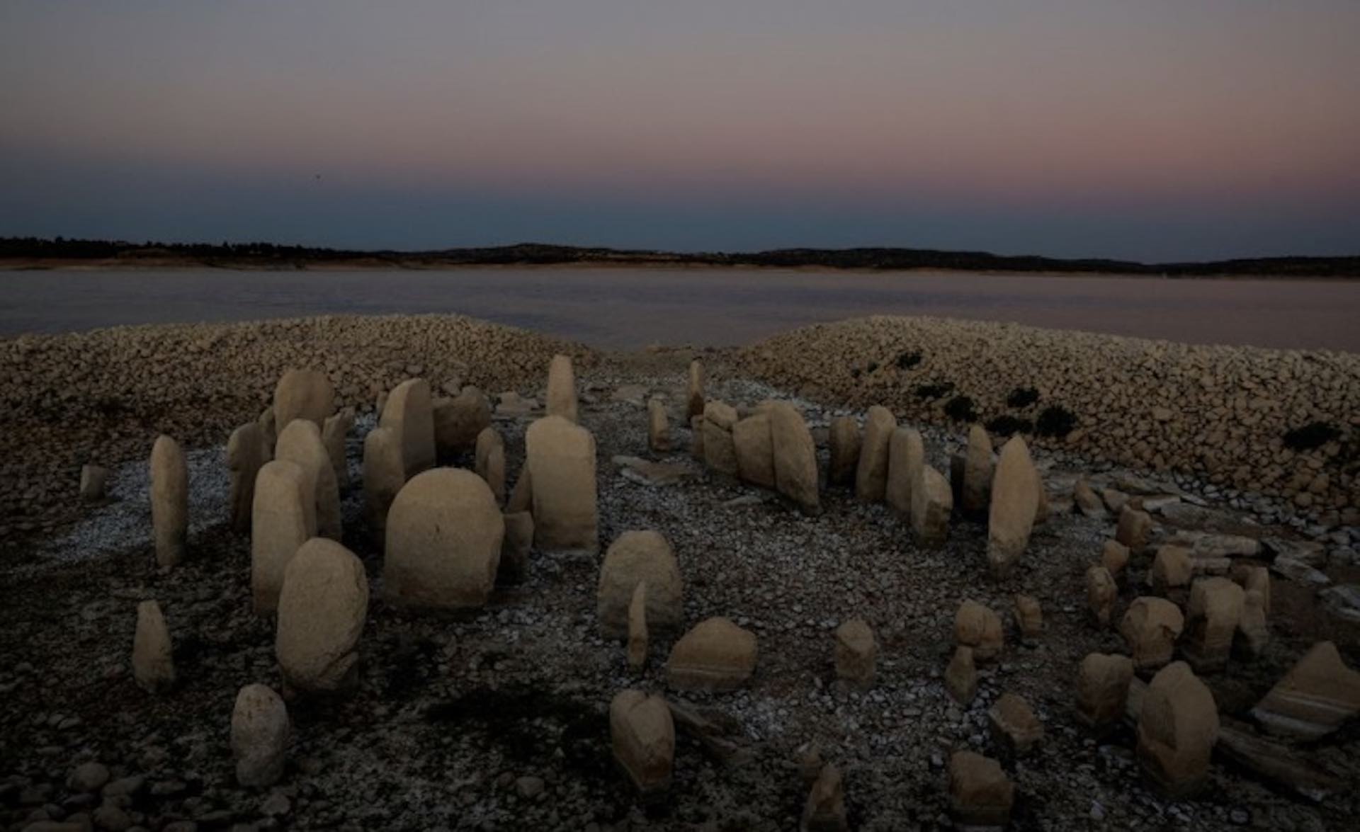 Drought reveals ancient stones and ships from World War II in Europe